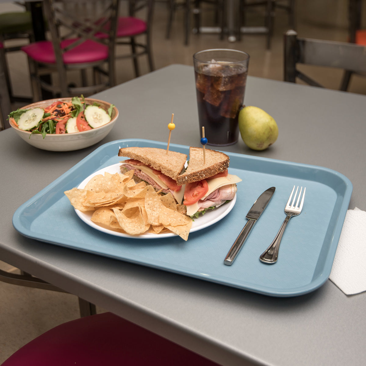 Carlisle CFS versatile cafeteria tray suitable for kids' meals and school lunch programs.