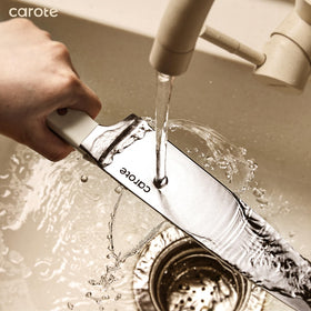 CAROTE 8-inch chef knife handles meats and vegetables with clean edges.