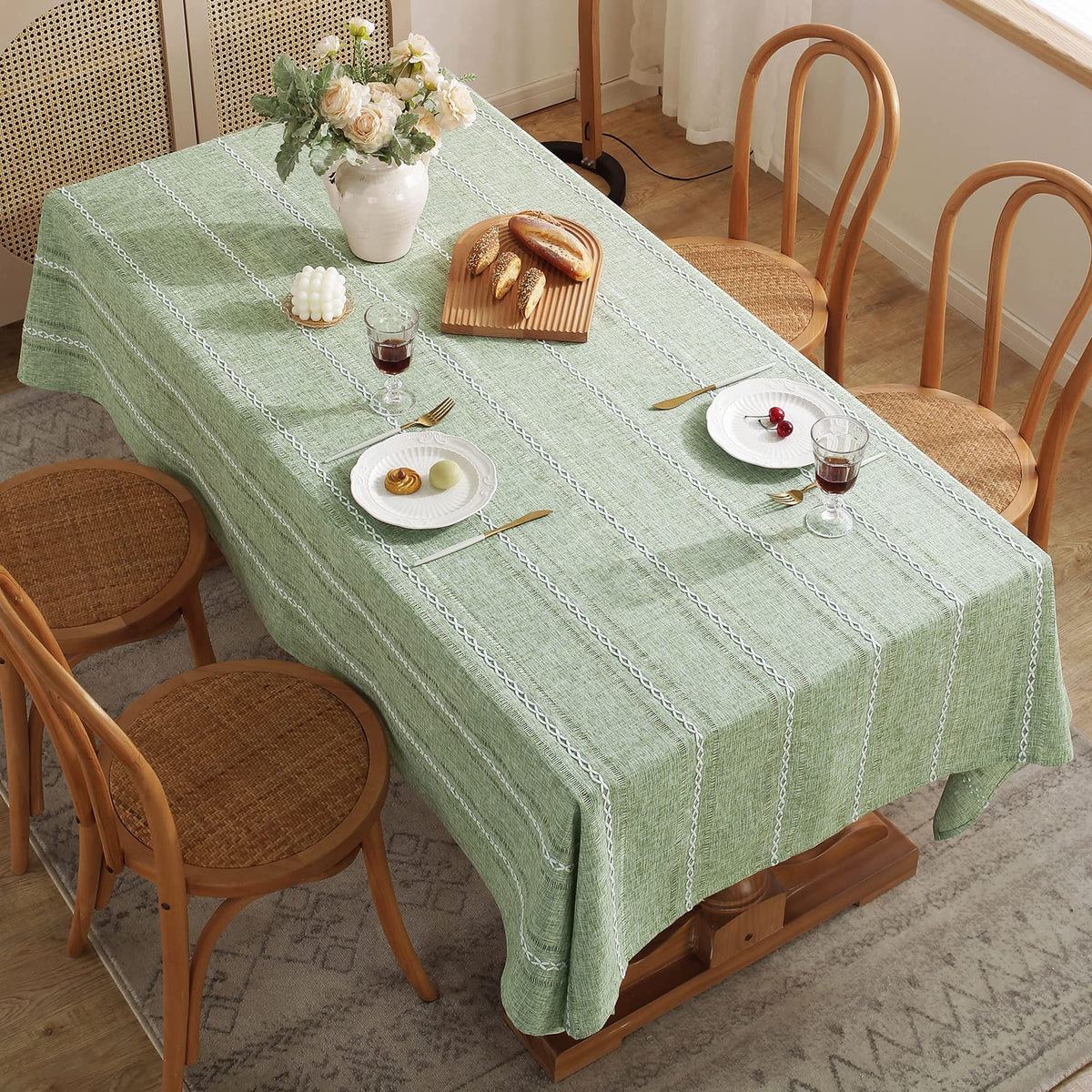 Chassic sage-green stripes enhance the dining room ambiance