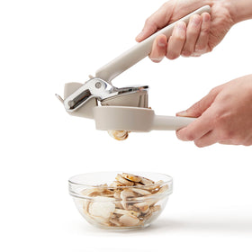 Two stainless blades keep produce in place during slicing