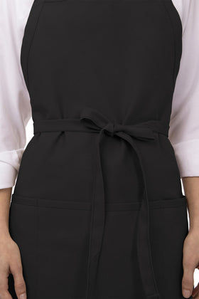 Chef Works three-pocket apron in black pockets, storage for notes and devices.