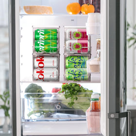 ClearSpace soda can organizer in action dispensing from the front saves fridge space.
