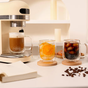 CNGLASS insulated glass mug held in hand during chilly mornings