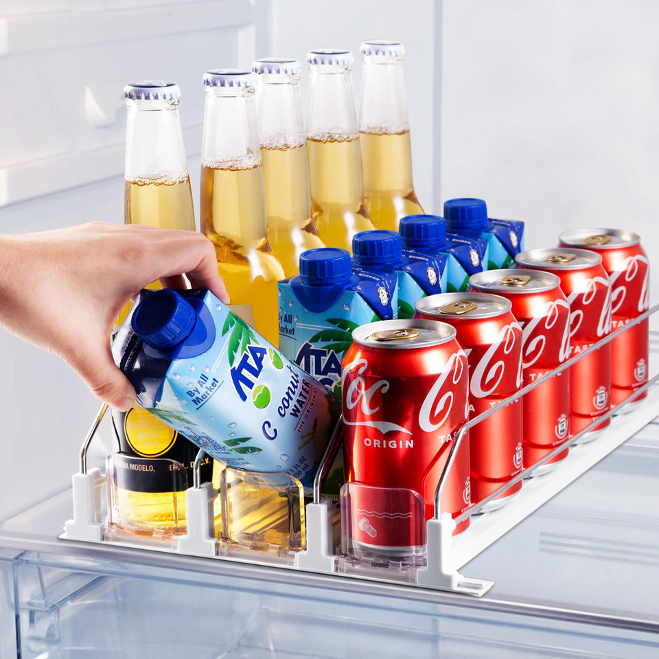 Coanto Drink Organizer in fridge with spring pusher for easy, forward-facing beverage access.