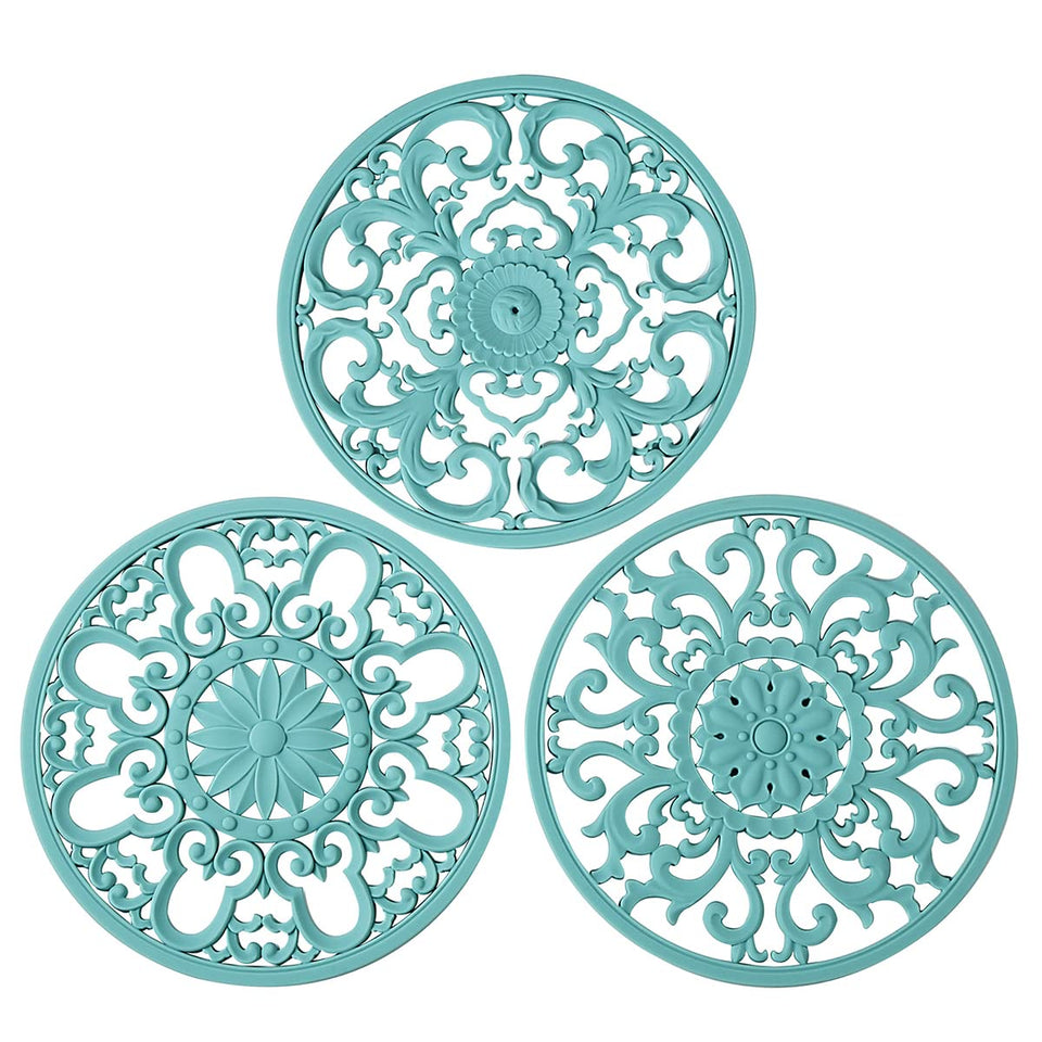 Colinda turquoise silicone trivet set with three designs protects surfaces from hot dishes.