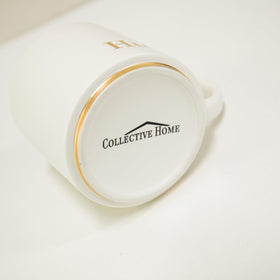 COLLECTIVE HOME gold-embellished mugs emphasize refined celebration aesthetics