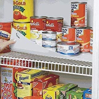Conimar shelf liner trimmed to fit a 16-inch shelf, creating a stable surface.