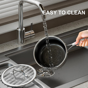 COOKER KING stay-cool handle design reduces heat exposure during cooking.