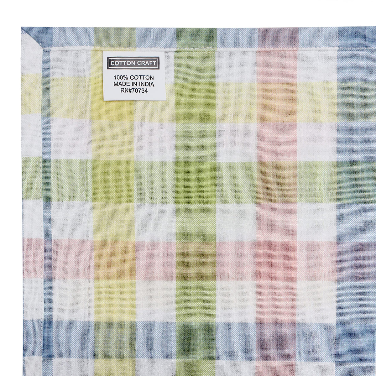 Hem detail on Cotton Craft tablecloth showcases refined finish for upscale tables.