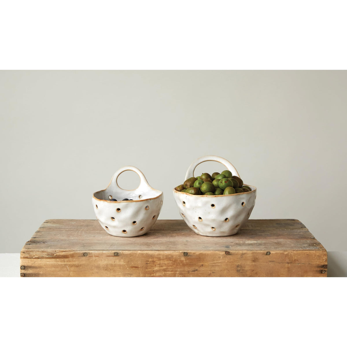 Creative Co-Op Cream Stoneware Colander large on display for draining larger produce