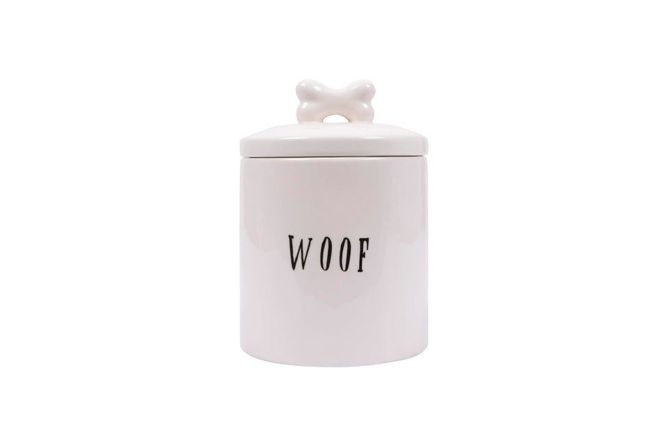 Creative Co-Op Woof Jar with bone-handle lid for stylish dog treat display.