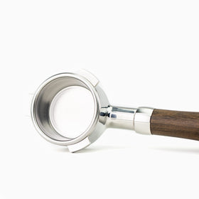 Crema 54mm basket showing single, double, and triple shot options.
