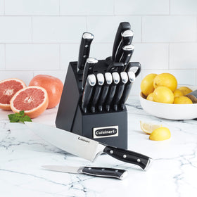 Knives, shears, and sharpening steel arranged in the block for easy maintenance