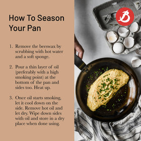 Seasoning process on De Buyer blue carbon steel pan with oil layer.
