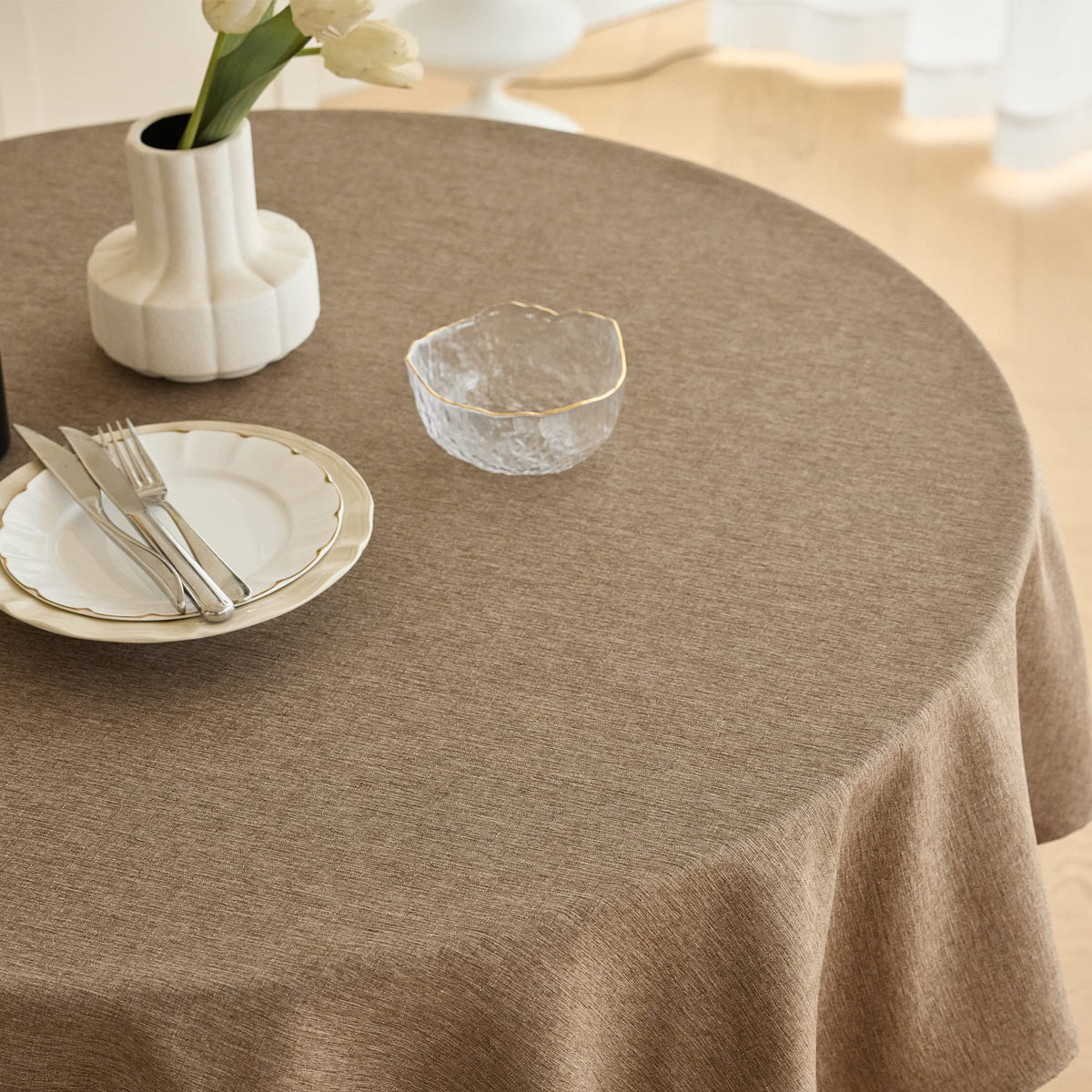 Decorelia faux linen round tablecloth in coffee color adds timeless style to dining.