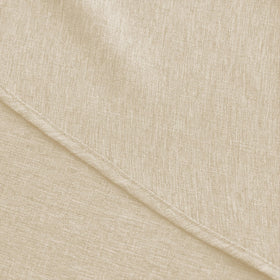 Decorelia tablecloth on indoor-outdoor dining setup during a family gathering.