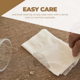 Decorelia spill-proof round tablecloth keeps two-to-four seat tables clean during meals.