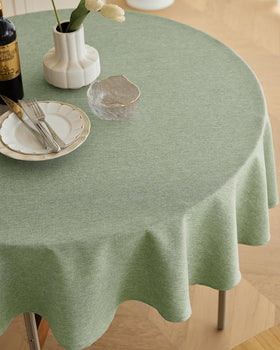 Decorelia waterproof round tablecloth in sage green for outdoor use