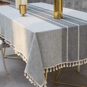 Deep Dream tablecloth embroidery close-up highlights refined gray stitching and decorative edging.