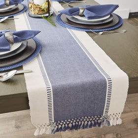 DII table runner styled on a dining table with dinnerware.