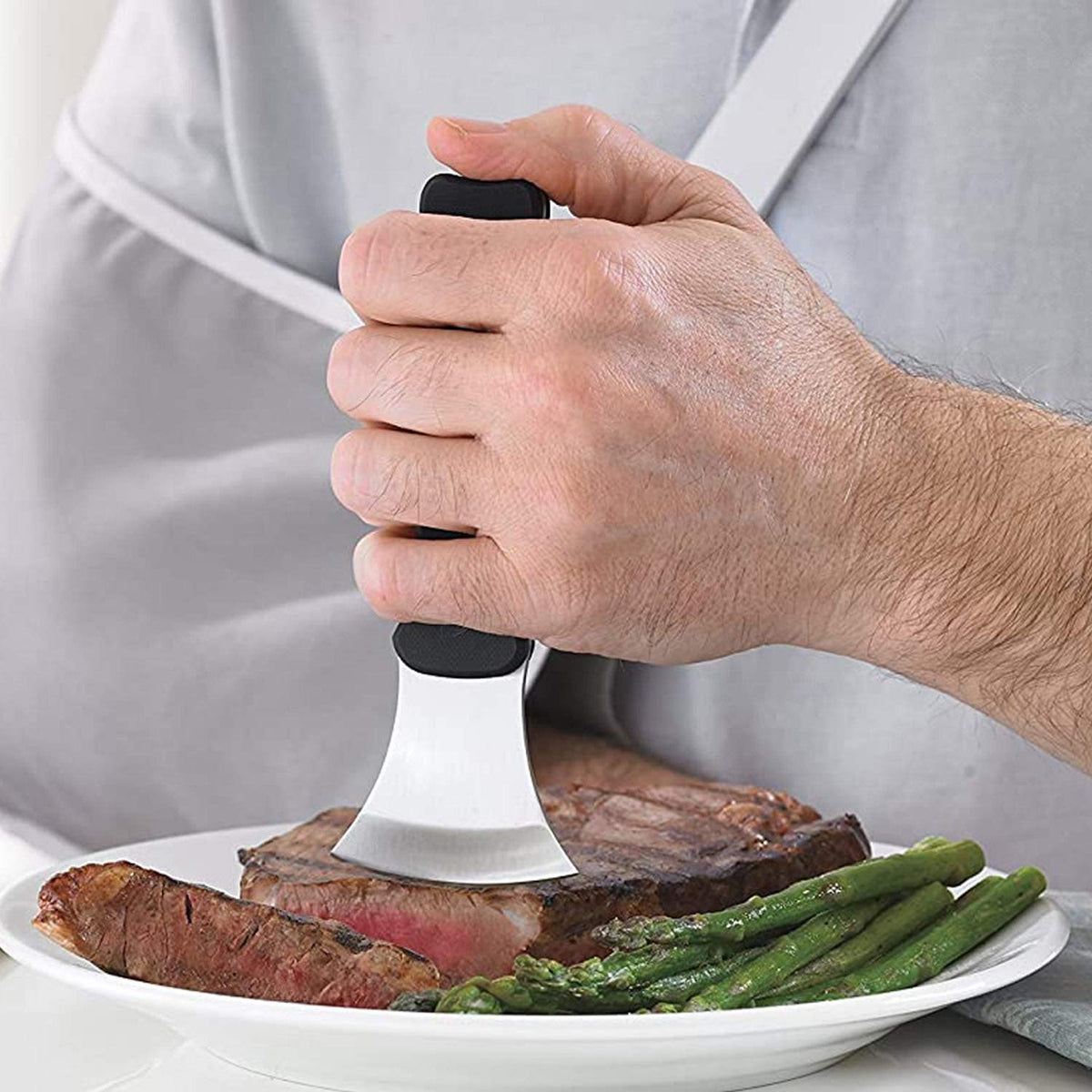 DMI curved knife with stainless blade delivers precise cuts.