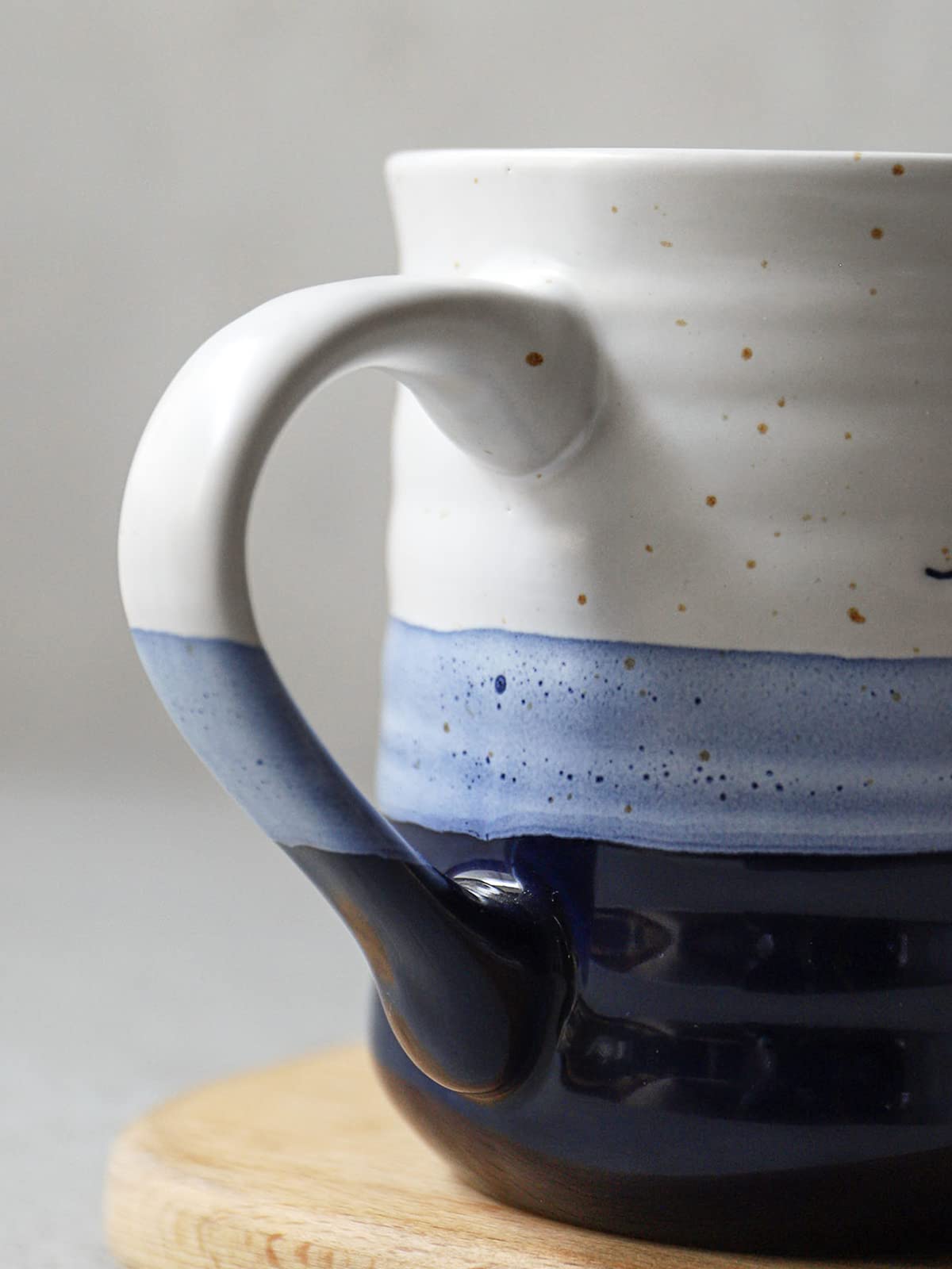 Dowan mug with ergonomic handle for a secure, comfortable grip.