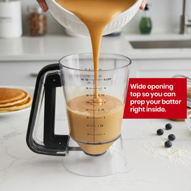 Eggssentials black pancake dispenser shown in side view for a modern kitchen setup.
