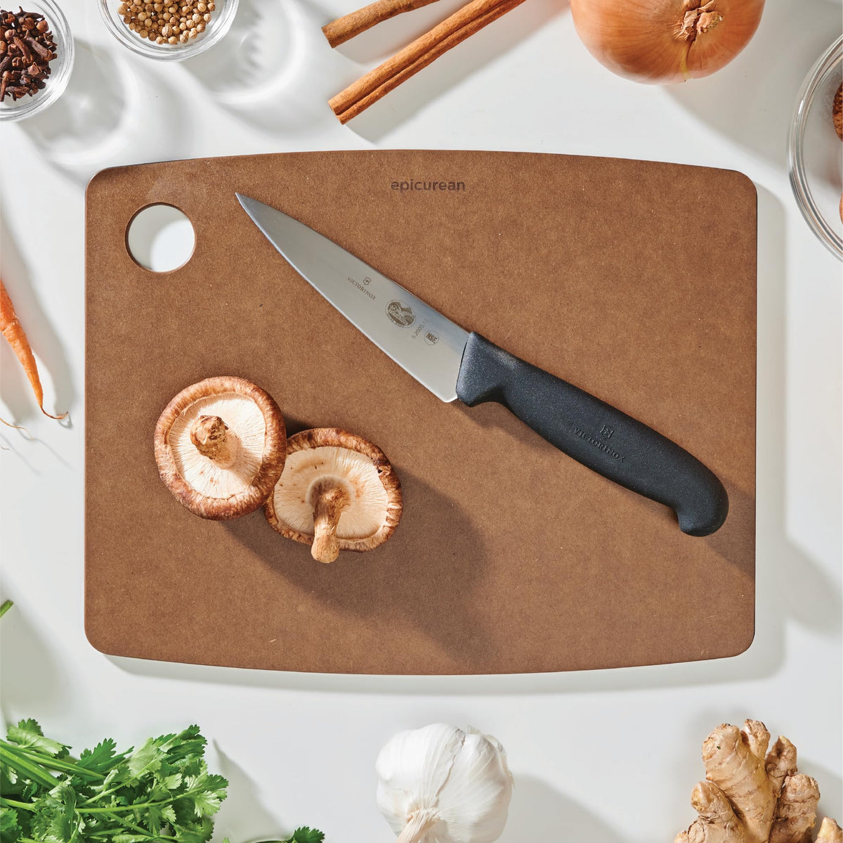 Epicurean Kitchen Series Nutmeg board in action showing chopping and dicing