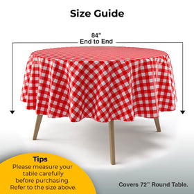 Exquisite round red gingham tablecloth on a dining setup for an outdoor meal
