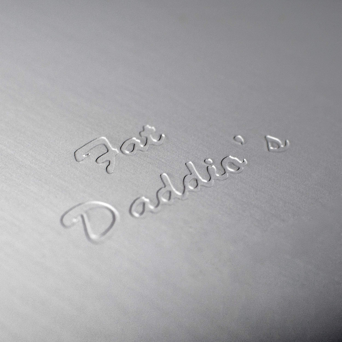 Fat Daddio's round cake pan in-oven ready, showcasing heat tolerance up to 550°F.
