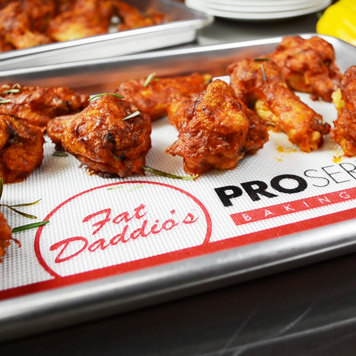 Fat Daddio's half-sheet pan 2-pack with silicone mat, versatile for baking.
