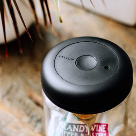 Fellow Atmos clear glass body showcases contents with contemporary style.
