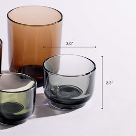 Fellow Pirch glass with tinted light reflections enhancing visual appeal