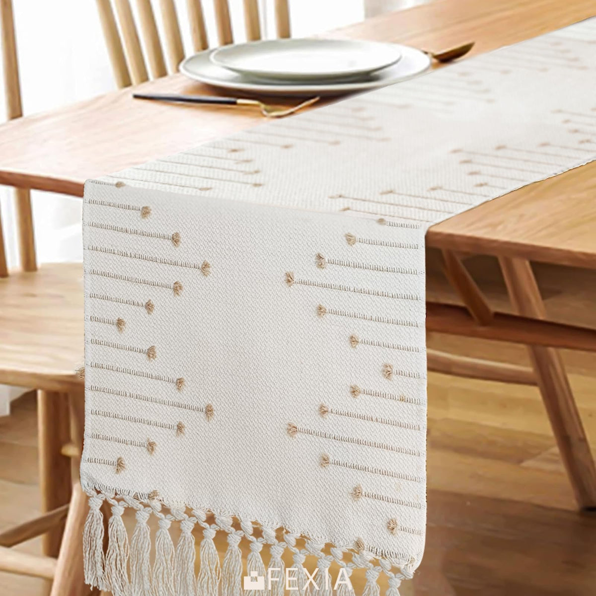FEXIA table runner set up for a wedding reception table with boho flair.
