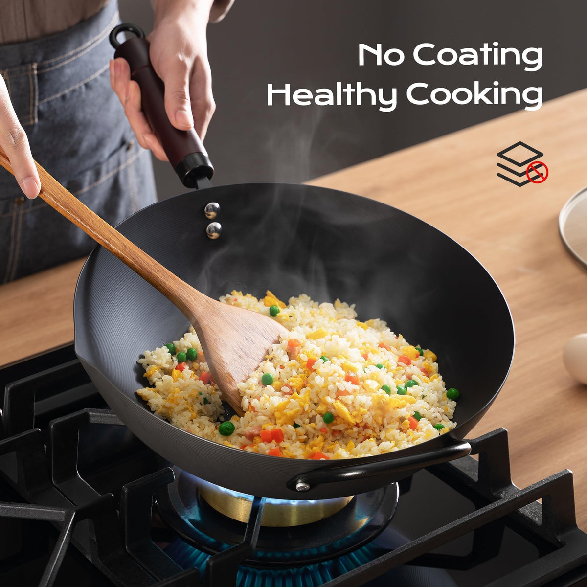 FGJ wok in action shows versatile use for stir-frying, frying, and boiling.