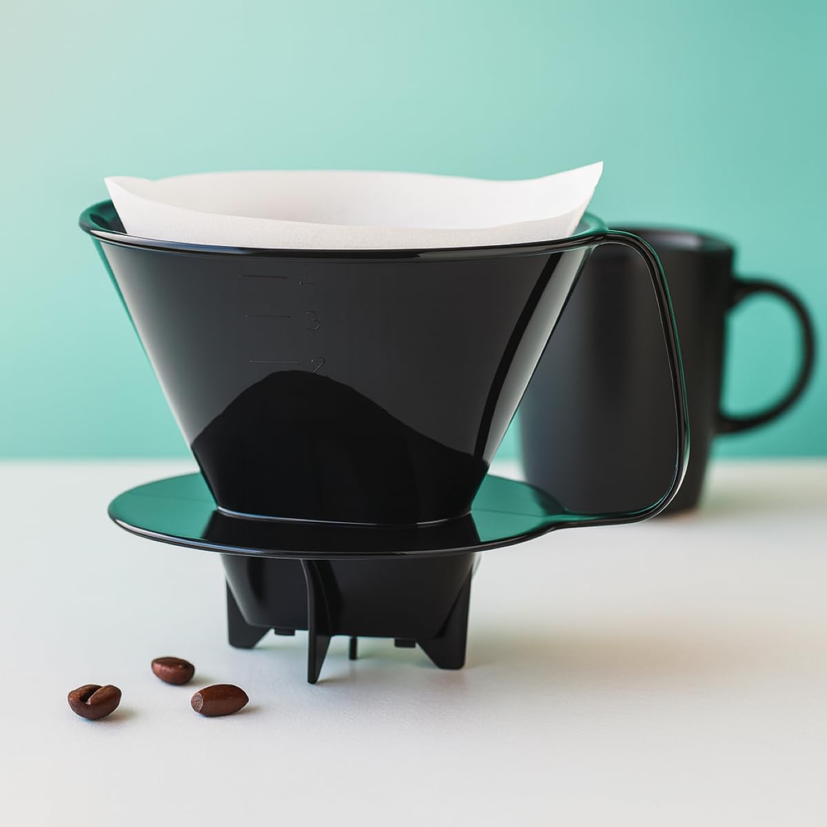 Fino cone supports disposable or reusable filters for flexible brewing.