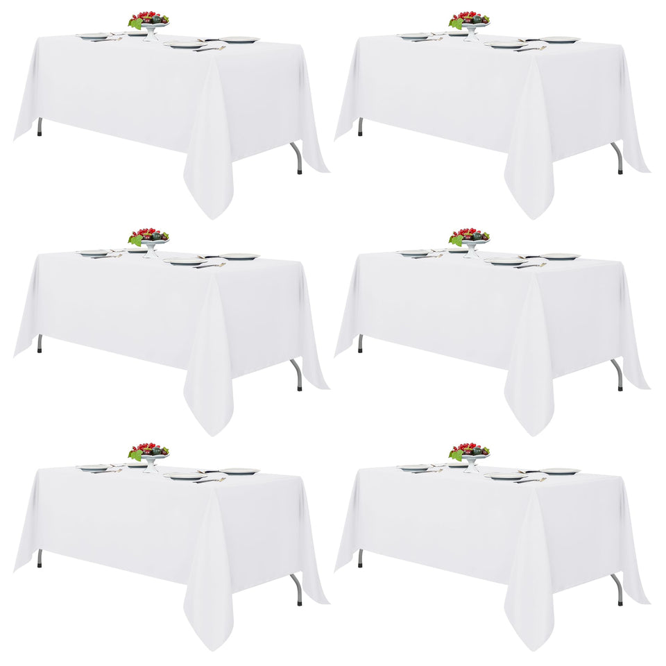 Fitable white rectangle tablecloth flatlay on 70x108 canvas for six-foot tables, showing clean finish.