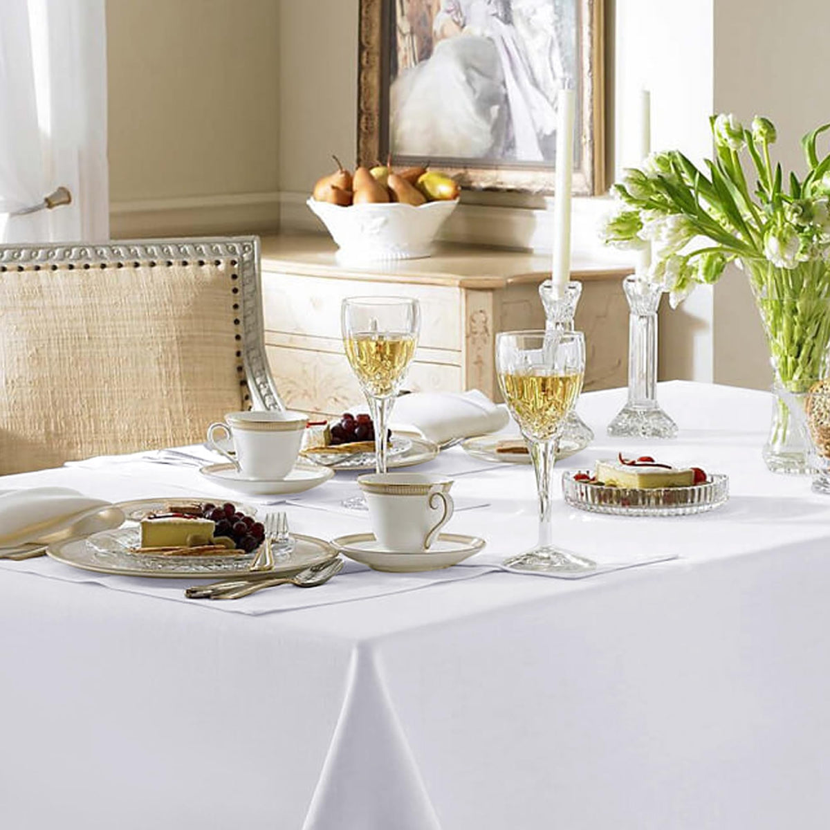 Fitable white dining rectangle tablecloth ready to dress a six-foot table.