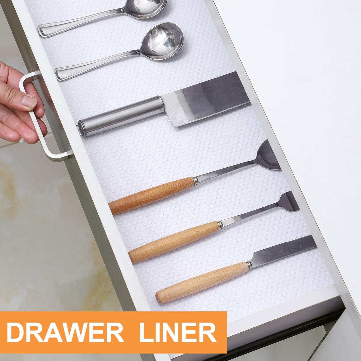 FLPMIX liner white being cut with scissors to fit a cabinet.