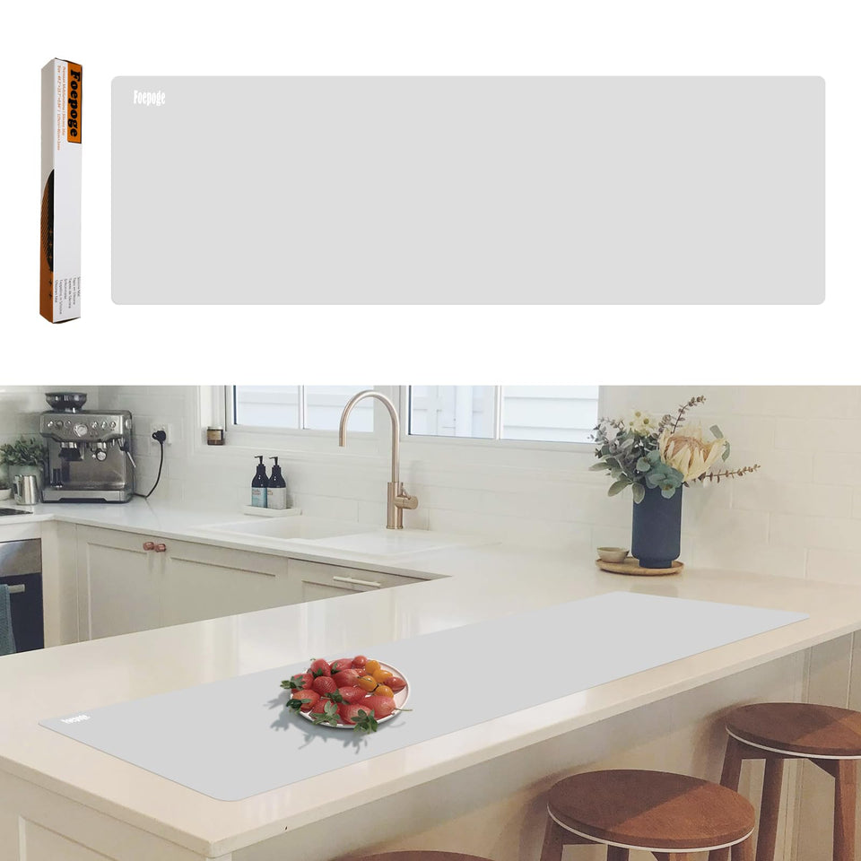 Foepoge large silicone mat on countertop provides heat protection and wide prep space.
