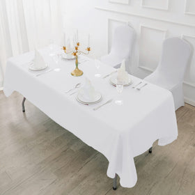 Elegant wedding or dinner setup using Fokitut tablecloth for protective coverage.