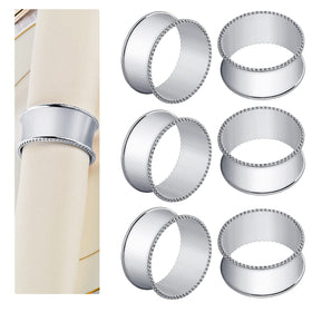 Frjjthchy bead side napkin ring in silver adds refined detail to a formal table setting.
