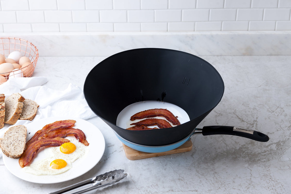 Frywall 12-inch guard with steam release for clean searing.