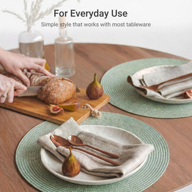 FunWheat round placemats fog green complement holiday and everyday tables.
