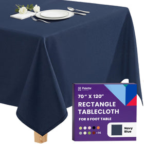 Gee Di Moda rectangle tablecloth on navy blue table for a polished formal dinner