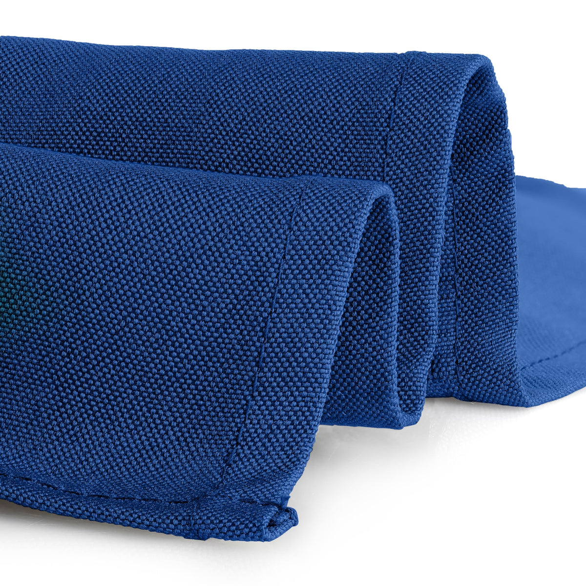 Royal blue tablecloth with floor-length drop draped on a banquet table.