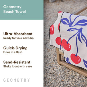 GEOMETRY Micro-Loop Beach Towel with sand-resistant weave reduces sticking grit.