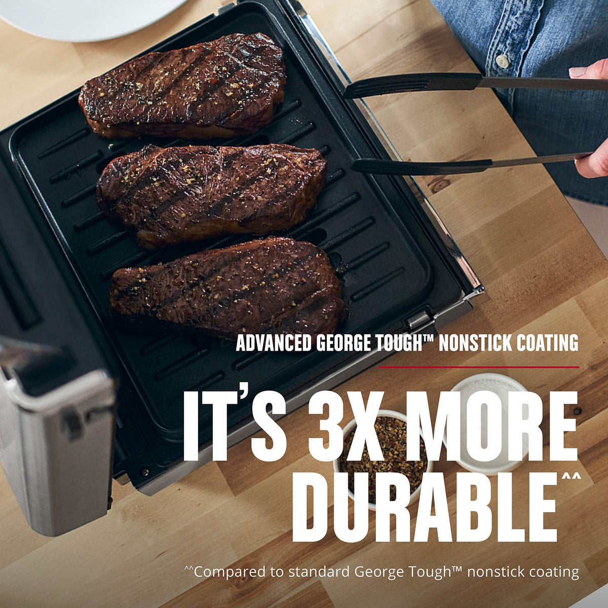 George Foreman Smokeless open plate design helps reduce smoke during cooking.