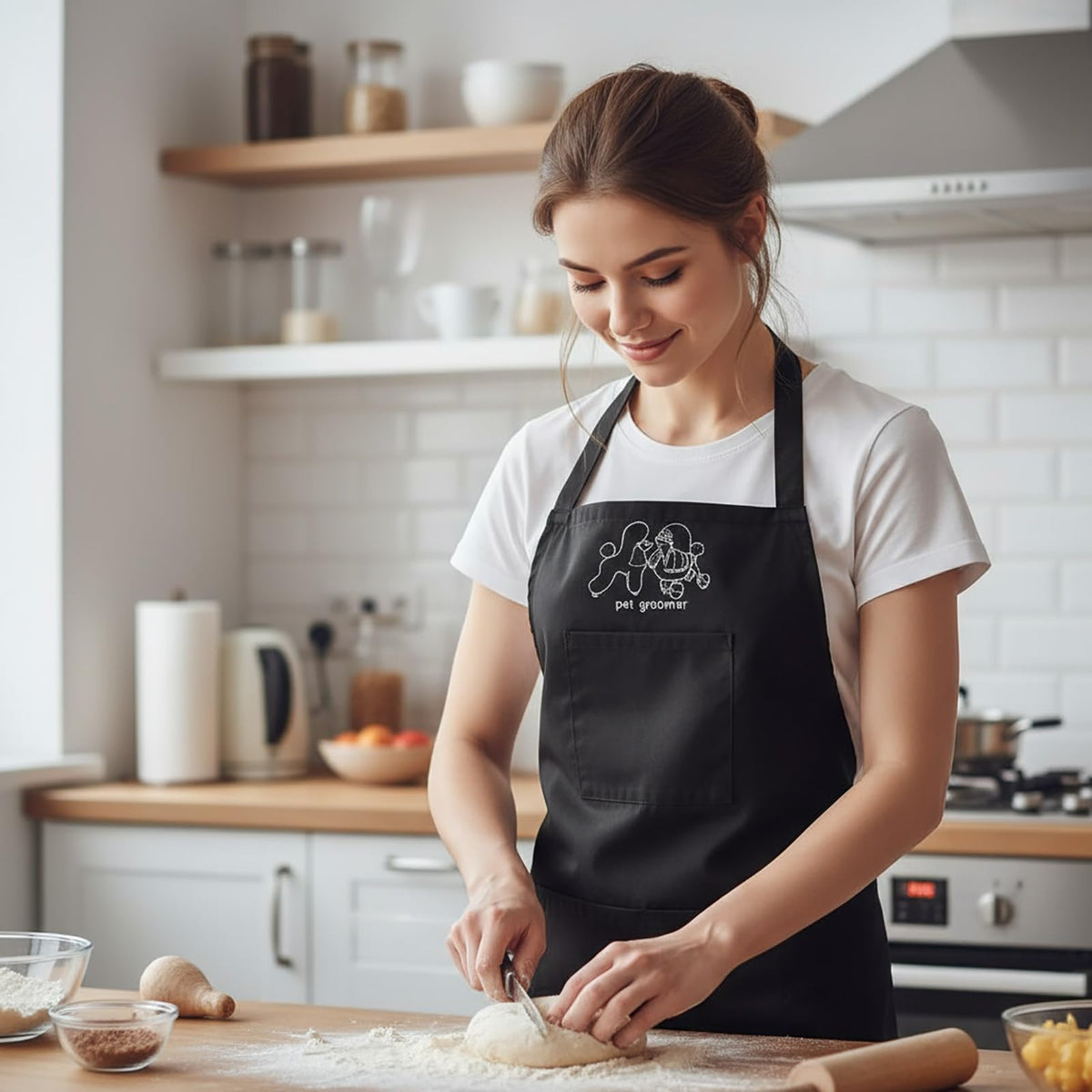 Waterproof Gliitatu apron resists hair sticking and cleans up easily.