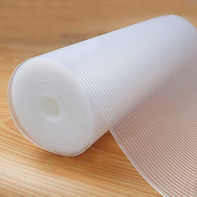 Glomen shelf liner with non-slip texture keeps items stable on shelves.
